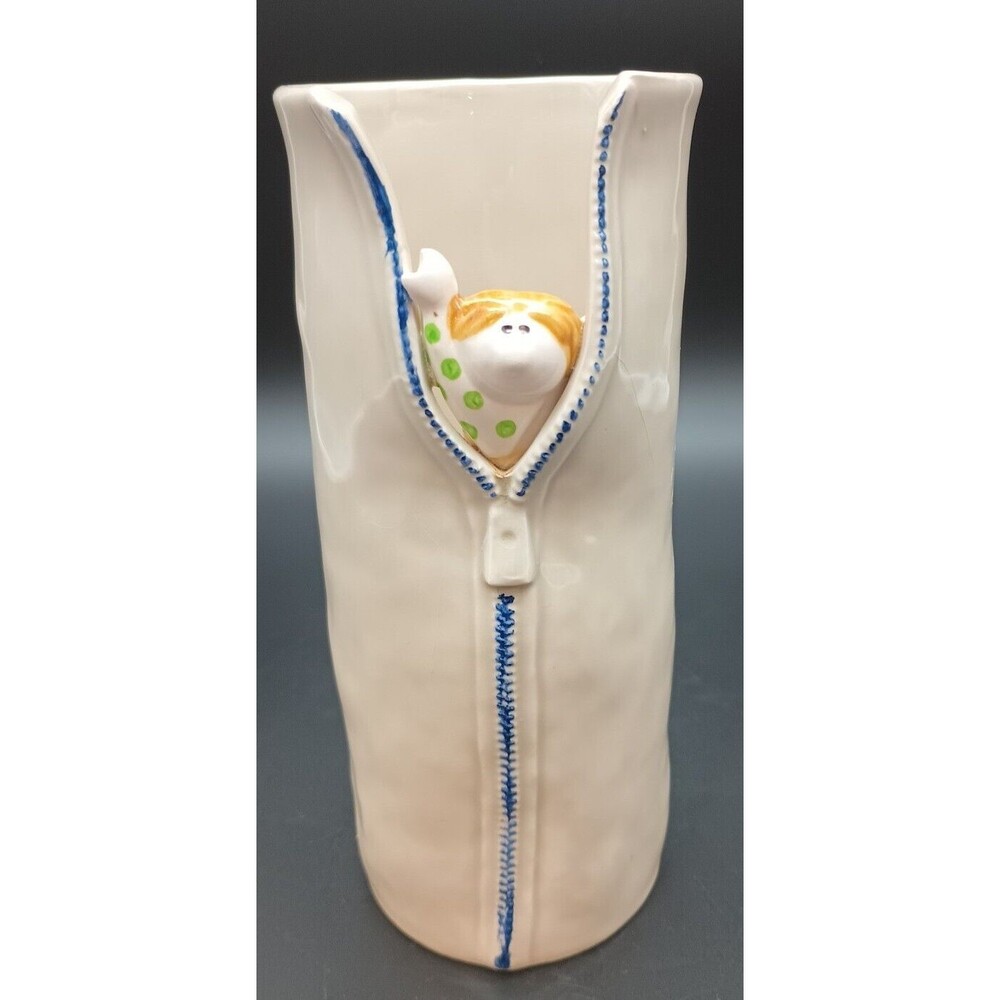 Charming Cream and Blue Ceramic Vase with Whimsical Design